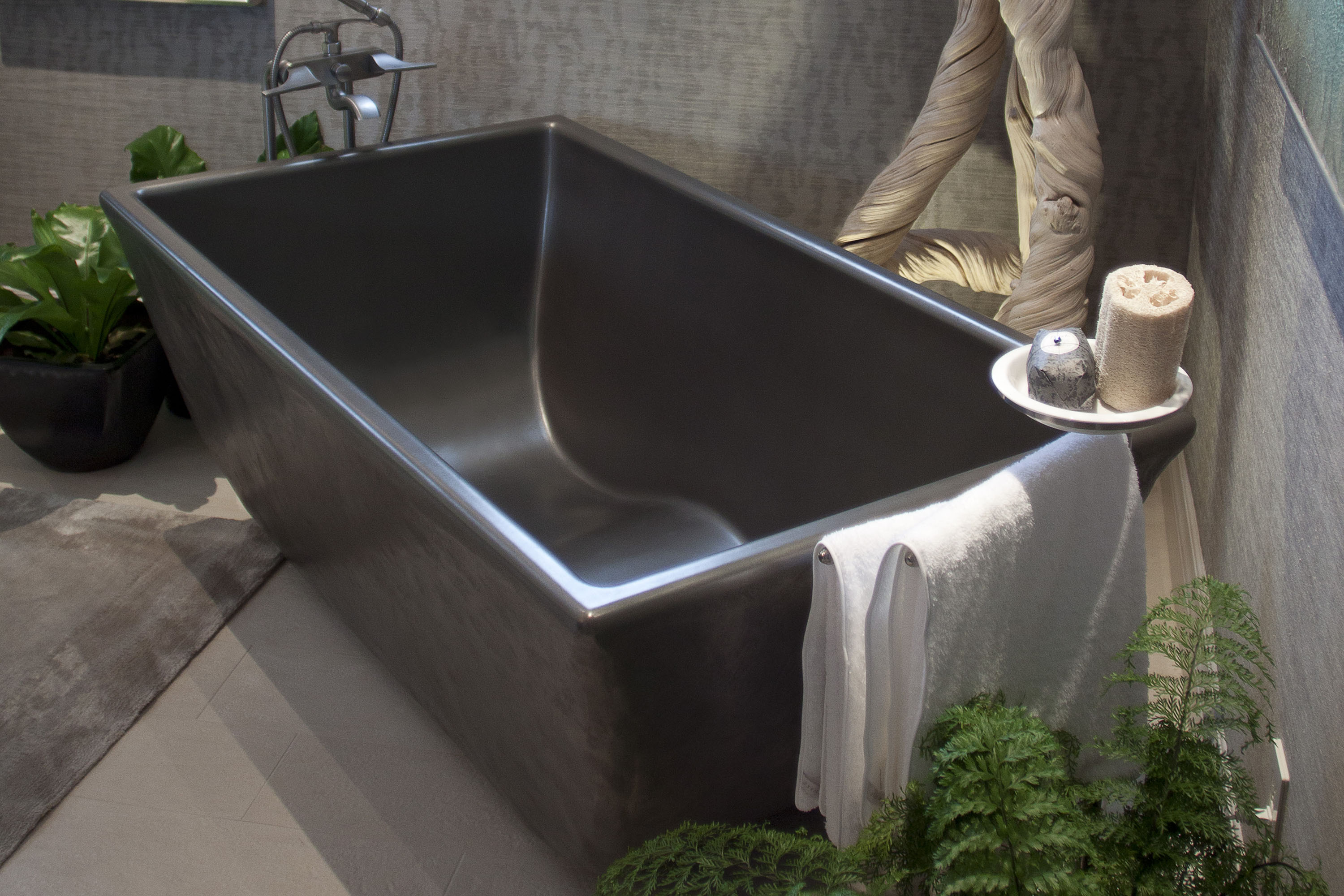 The Indulge Concrete Soaking Tub, MetalCrete Pewter Finish (Exterior Only)